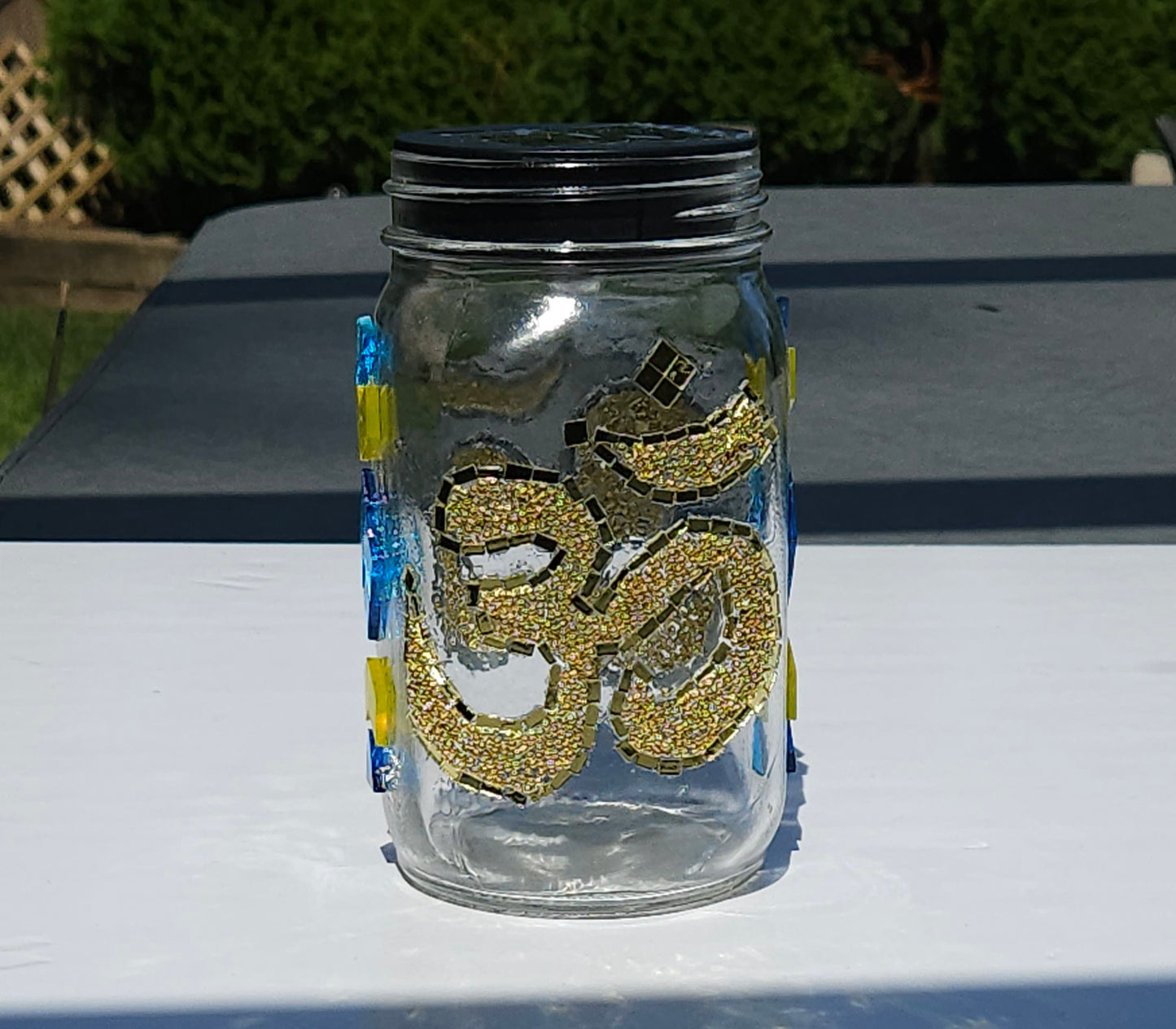Om Mosaic Solar Light Jar – Gold Meditation Lantern with Spiritual Glow